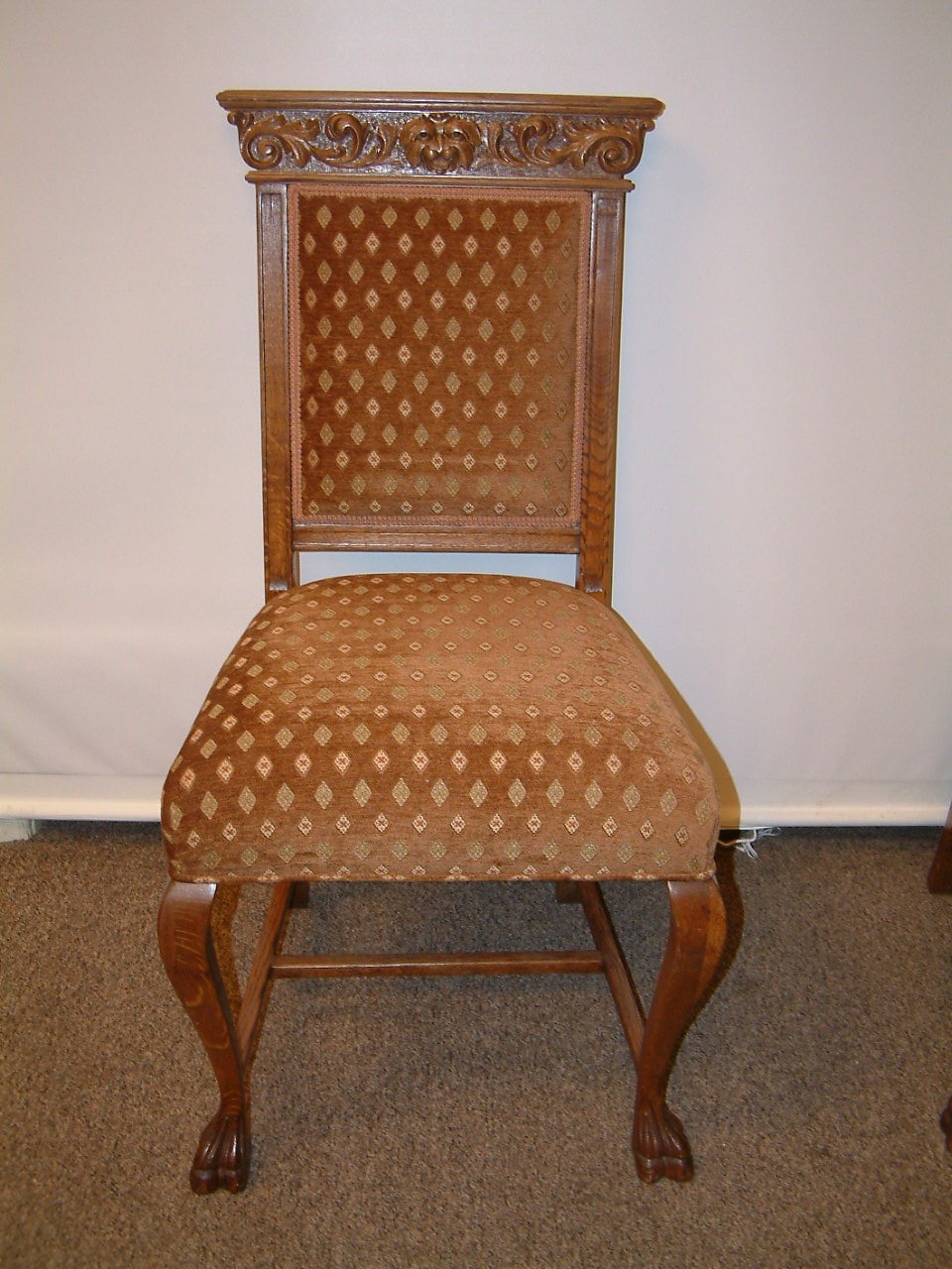 fancy carved oak griffin adorned dining chair